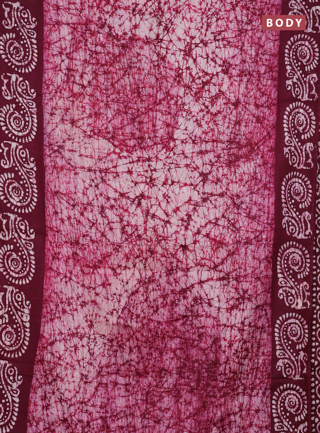 Batik cotton saree wine shade with allover prints and batik printed border
