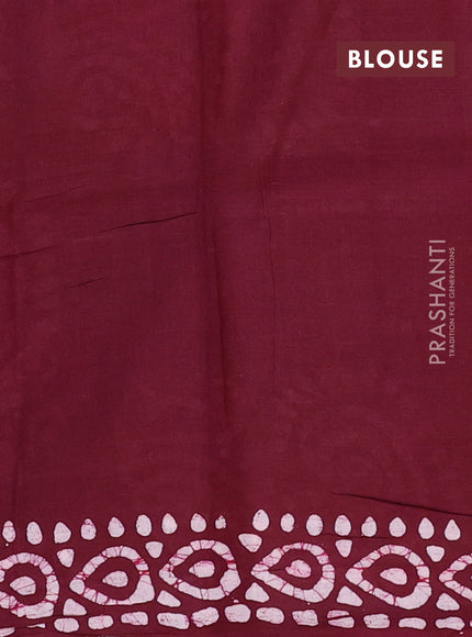 Batik cotton saree wine shade with allover prints and batik printed border