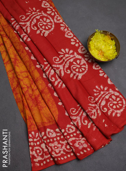 Batik cotton saree mango yellow and red with allover prints and batik printed border