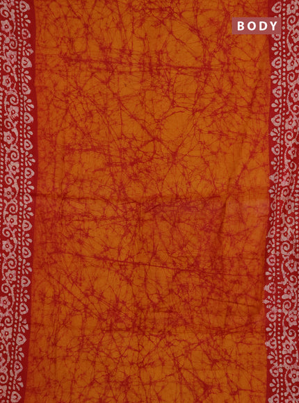 Batik cotton saree mango yellow and red with allover prints and batik printed border