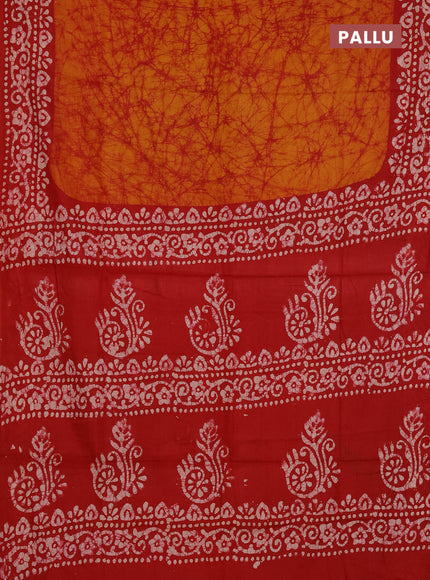 Batik cotton saree mango yellow and red with allover prints and batik printed border