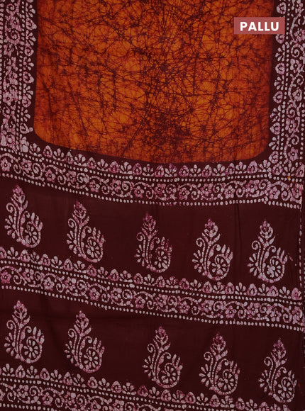 Batik cotton saree dark mustard and deep maroon with allover prints and batik printed border