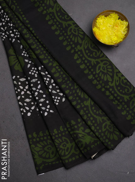 Batik cotton saree olive green with allover prints and batik printed border
