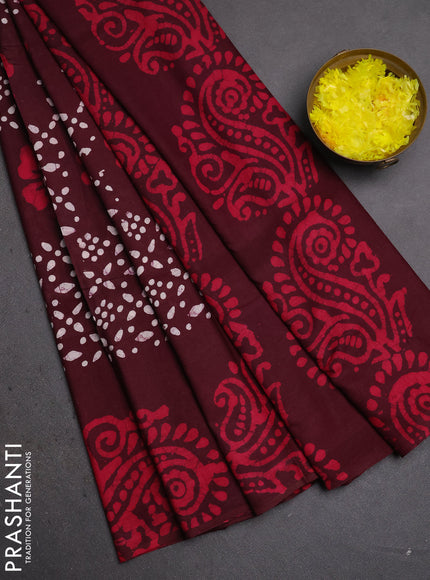 Batik cotton saree deep wine shade with allover prints and batik printed border