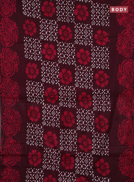 Batik cotton saree deep wine shade with allover prints and batik printed border