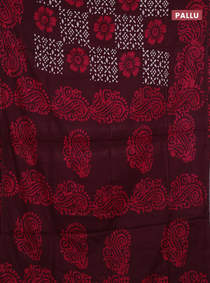Batik cotton saree deep wine shade with allover prints and batik printed border