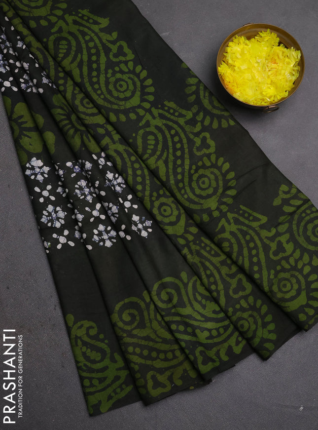Batik cotton saree olive green with allover prints and batik printed border