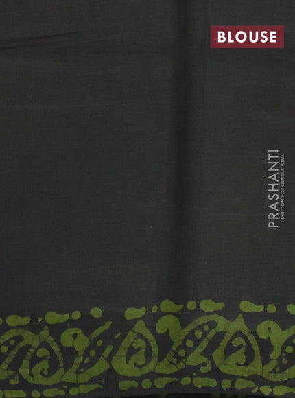Batik cotton saree olive green with allover prints and batik printed border