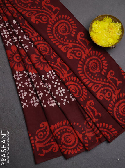 Batik cotton saree deep wine shade with allover prints and batik printed border