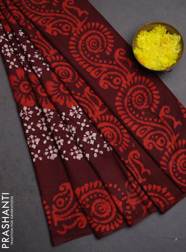 Batik cotton saree deep wine shade with allover prints and batik printed border