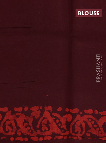 Batik cotton saree deep wine shade with allover prints and batik printed border