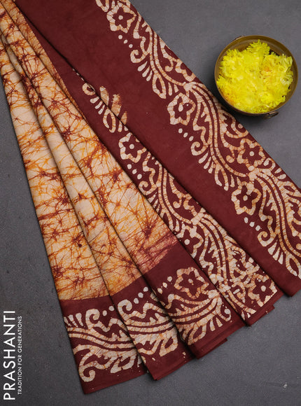 Batik cotton saree beige and deep maroon with allover prints and batik printed border