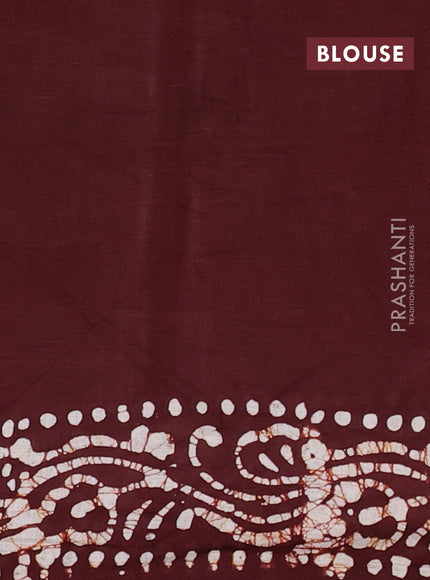 Batik cotton saree beige and deep maroon with allover prints and batik printed border