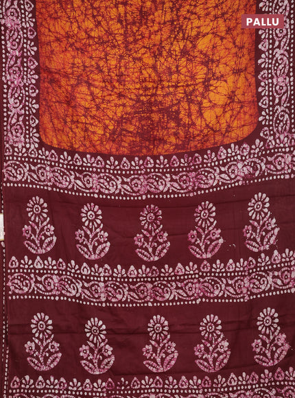 Batik cotton saree mango yellow and deep maroon with allover prints and batik printed border
