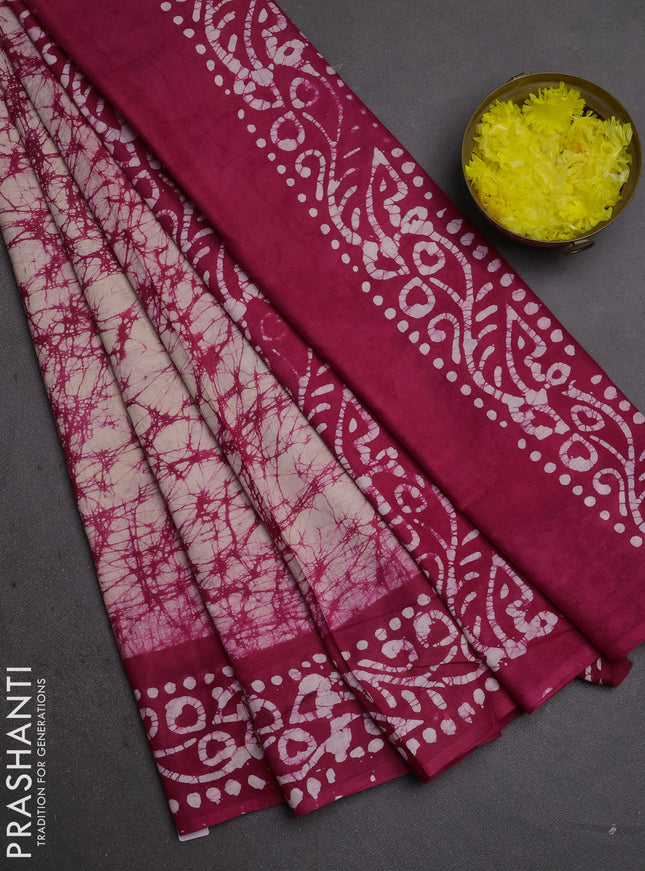 Batik cotton saree beige and pink with allover prints and batik printed border