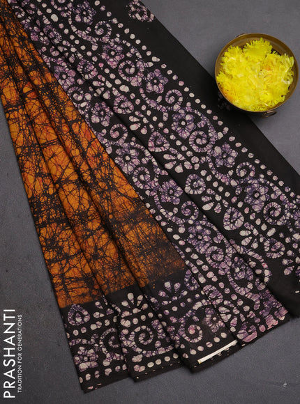 Batik cotton saree dark mustard and wine shade with allover prints and batik printed border