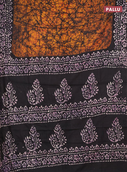 Batik cotton saree dark mustard and wine shade with allover prints and batik printed border