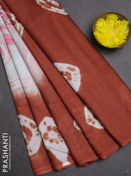 Batik cotton saree multi colour and rust shade with allover prints and batik printed border
