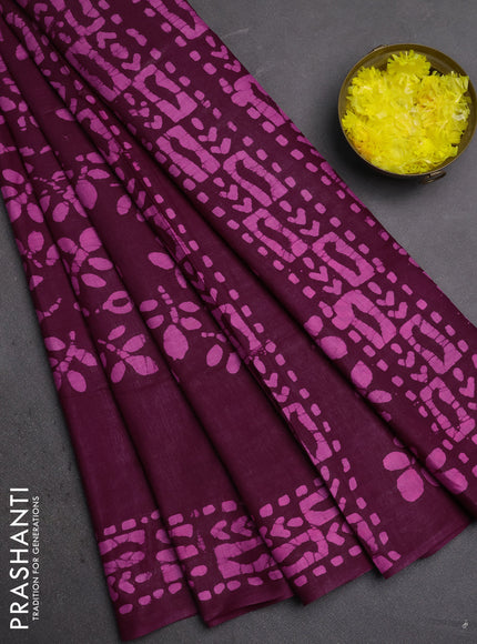 Batik cotton saree wine shade with allover prints and batik printed border