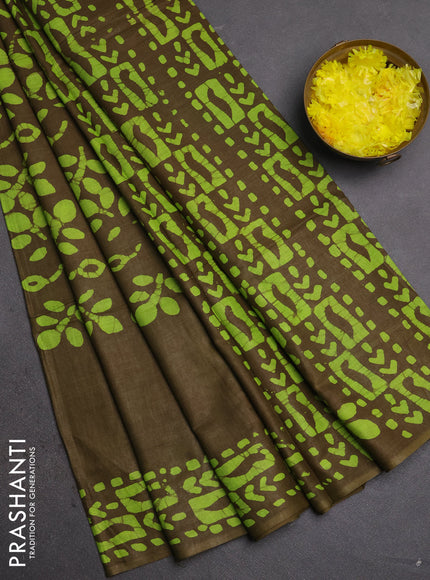 Batik cotton saree mehendi green with allover prints and batik printed border