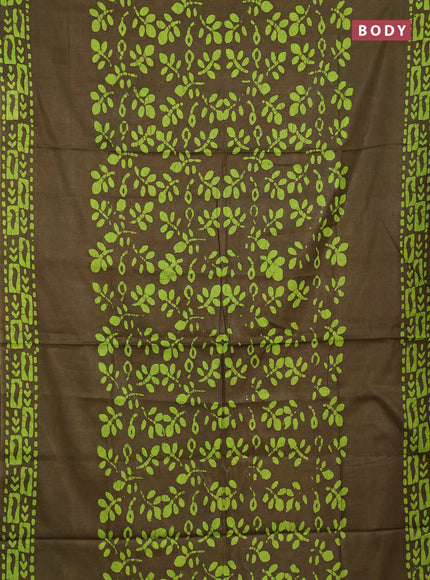 Batik cotton saree mehendi green with allover prints and batik printed border