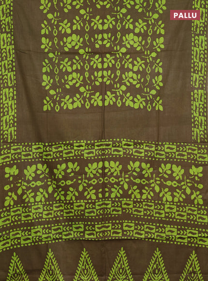 Batik cotton saree mehendi green with allover prints and batik printed border