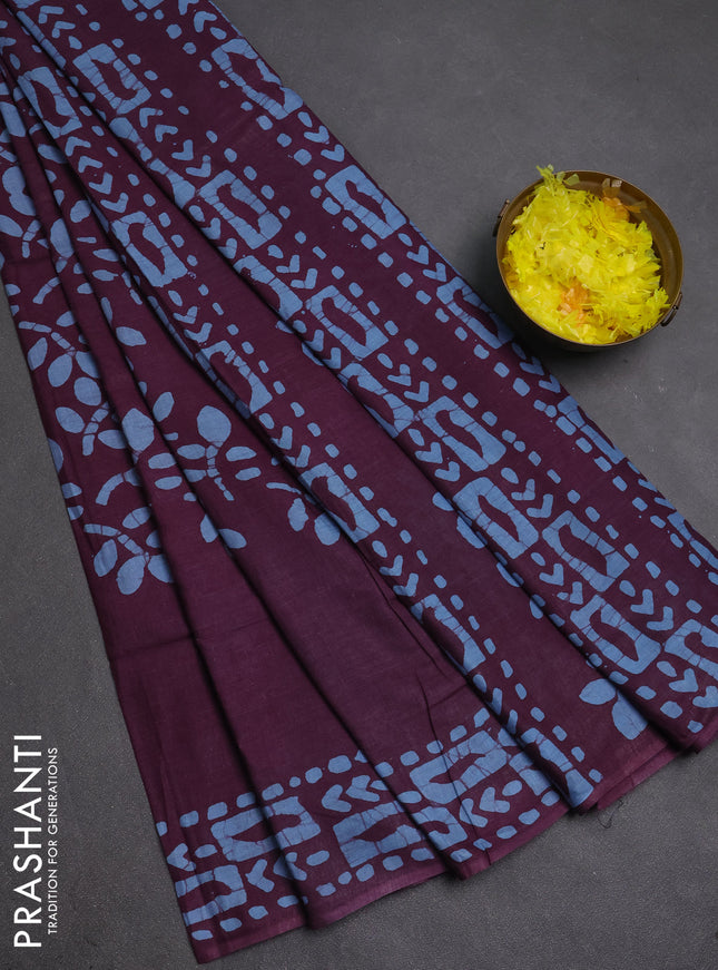 Batik cotton saree deep purple with allover prints and batik printed border