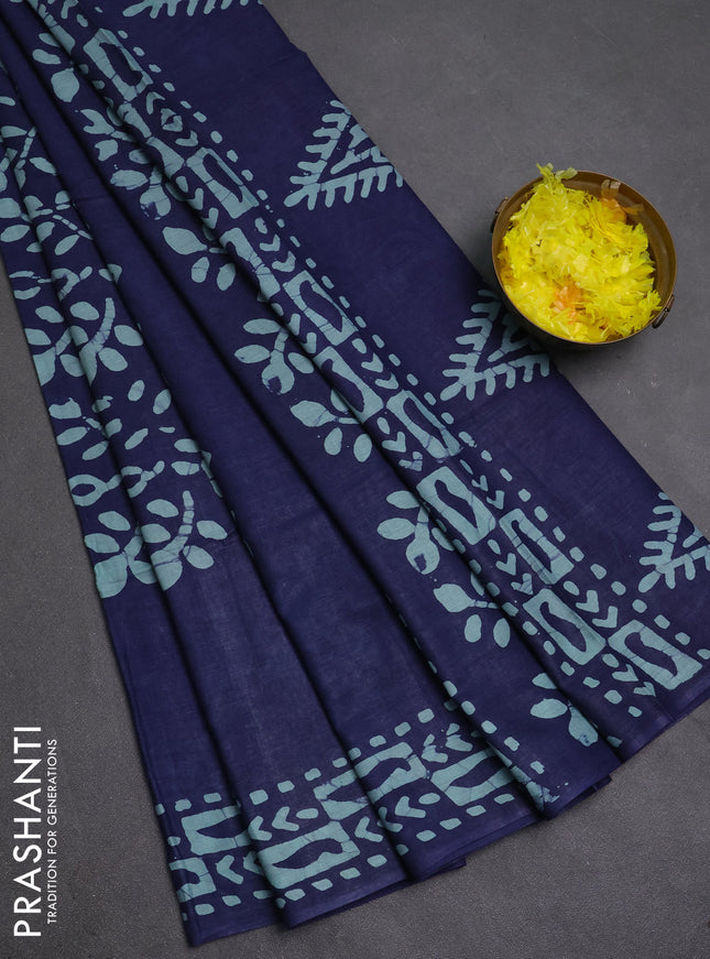Batik cotton saree blue with allover prints and batik printed border