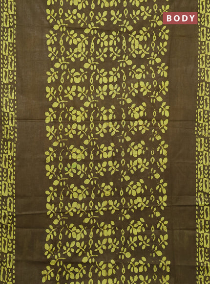 Batik cotton saree mehendi green with allover prints and batik printed border