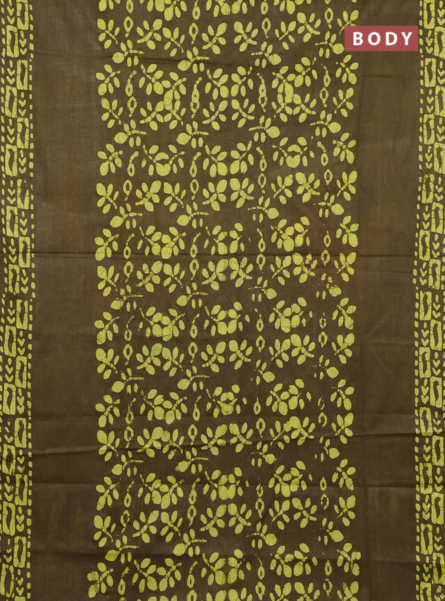 Batik cotton saree mehendi green with allover prints and batik printed border