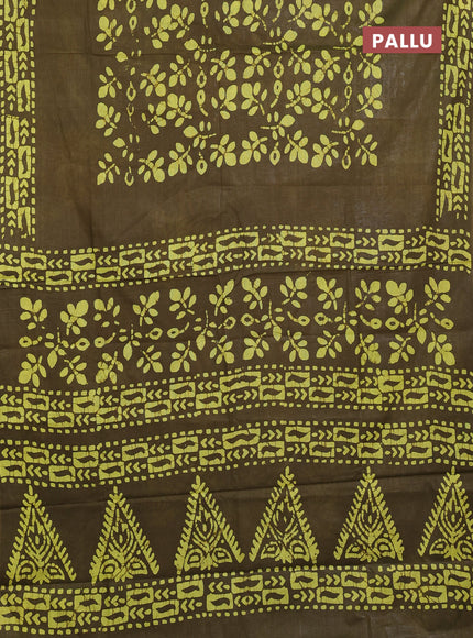 Batik cotton saree mehendi green with allover prints and batik printed border