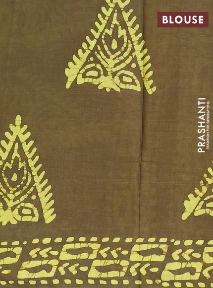 Batik cotton saree mehendi green with allover prints and batik printed border