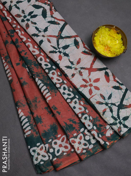 Batik cotton saree rust shade and green with batik butta prints and batik printed border