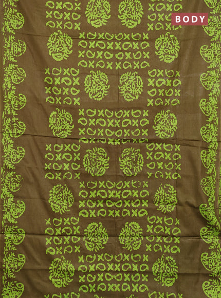 Batik cotton saree mehendi green with allover prints and batik printed border