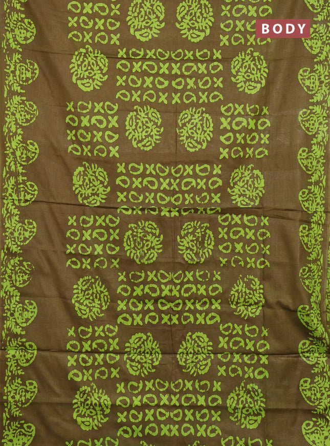 Batik cotton saree mehendi green with allover prints and batik printed border