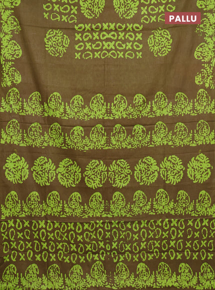 Batik cotton saree mehendi green with allover prints and batik printed border