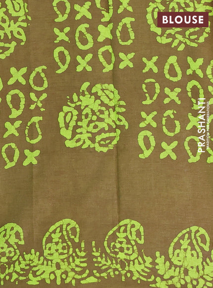 Batik cotton saree mehendi green with allover prints and batik printed border