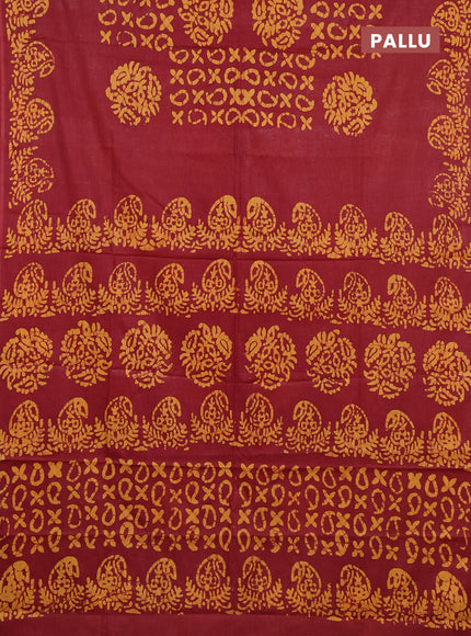 Batik cotton saree maroon and mustard yellow with allover prints and batik printed border