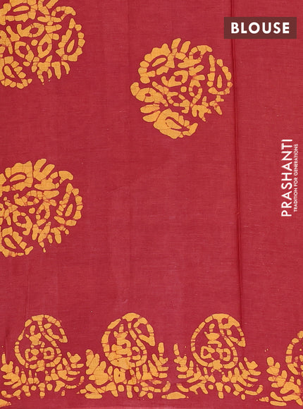 Batik cotton saree maroon and mustard yellow with allover prints and batik printed border