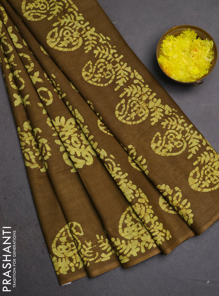 Batik cotton saree mehendi green with allover prints and batik printed border