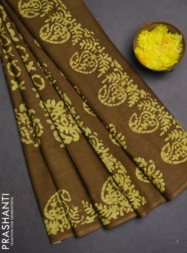 Batik cotton saree mehendi green with allover prints and batik printed border