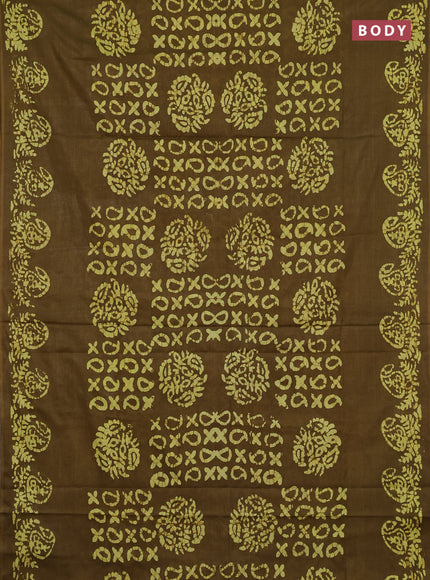 Batik cotton saree mehendi green with allover prints and batik printed border