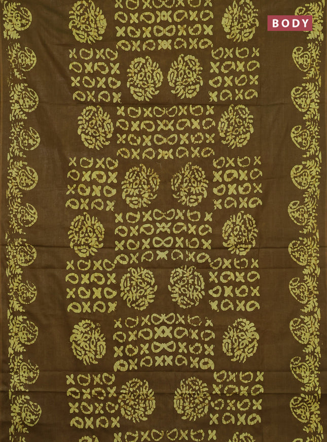 Batik cotton saree mehendi green with allover prints and batik printed border