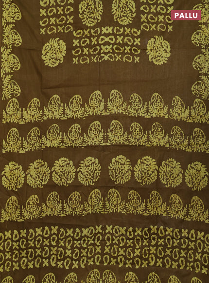 Batik cotton saree mehendi green with allover prints and batik printed border