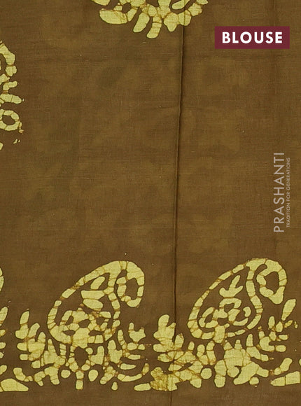 Batik cotton saree mehendi green with allover prints and batik printed border