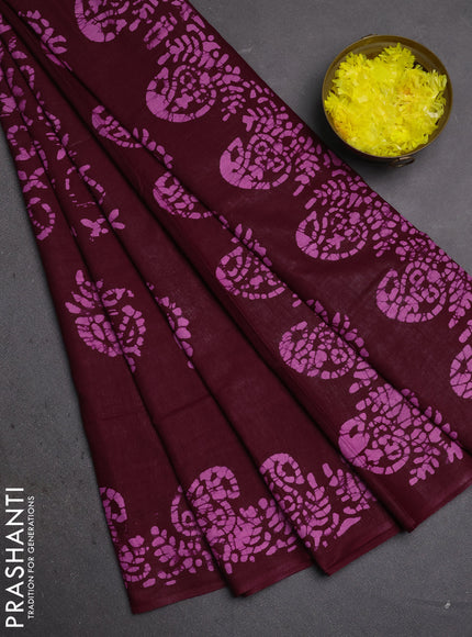 Batik cotton saree wine shade with allover prints and batik printed border