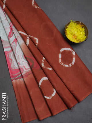 Batik cotton saree multi colour and rustic orange with allover prints and batik printed border