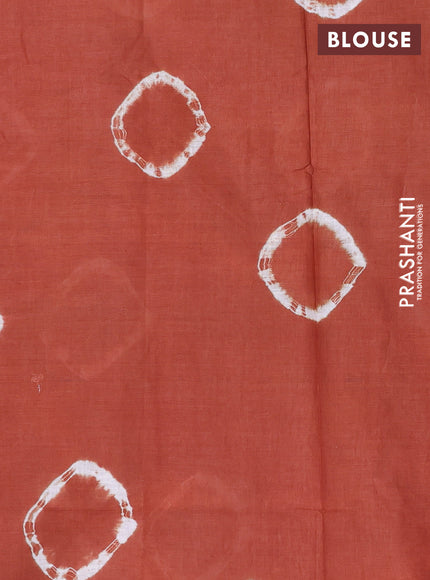 Batik cotton saree multi colour and rustic orange with allover prints and batik printed border