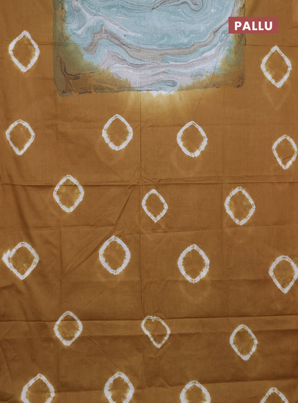 Batik cotton saree multi colour and dark mustard with allover prints and batik printed border