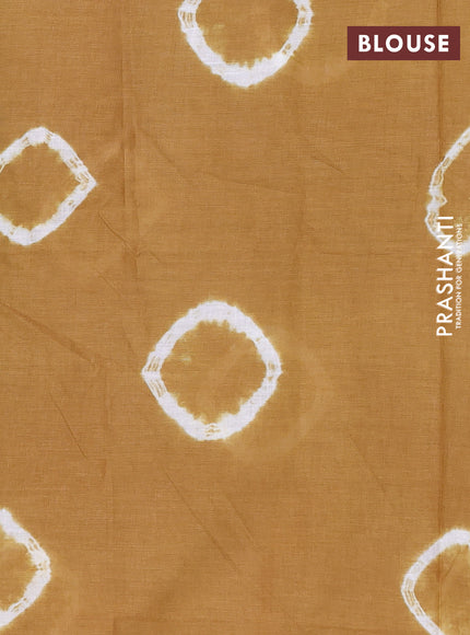 Batik cotton saree multi colour and dark mustard with allover prints and batik printed border